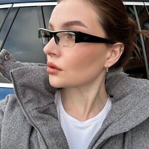 Miu Miu MUB07S 16K08N Sunglasses Black Rectangle Frame, Blue-Violet Filter